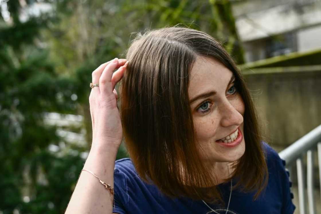 Amber Pearson, who received a brain implant to treat her epilepsy and Obsessive Compulsive disorder (OCD), shows the approximate placement of a brain implant received at the Oregon Health and Science University (OHSU) hospital in Portland, Oregon Amber Pearson, who received a brain implant to treat her epilepsy and Obsessive Compulsive disorder (OCD), shows the approximate placement of a brain implant received at the Oregon Health and Science University (OHSU) hospital in Portland, Oregon