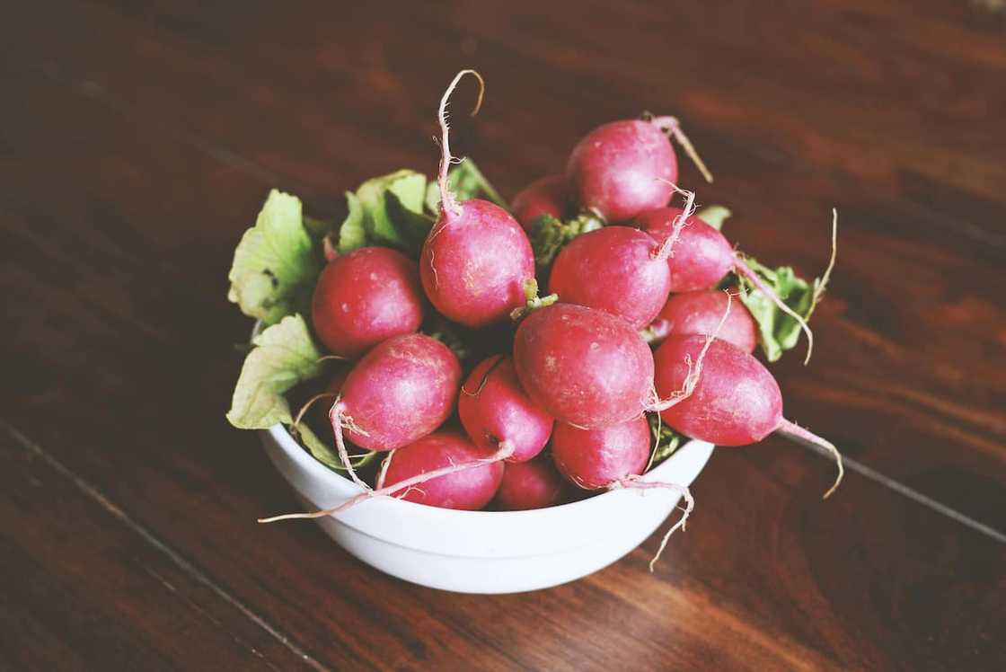 Radishes in a white bowl Radishes in a white bowl
