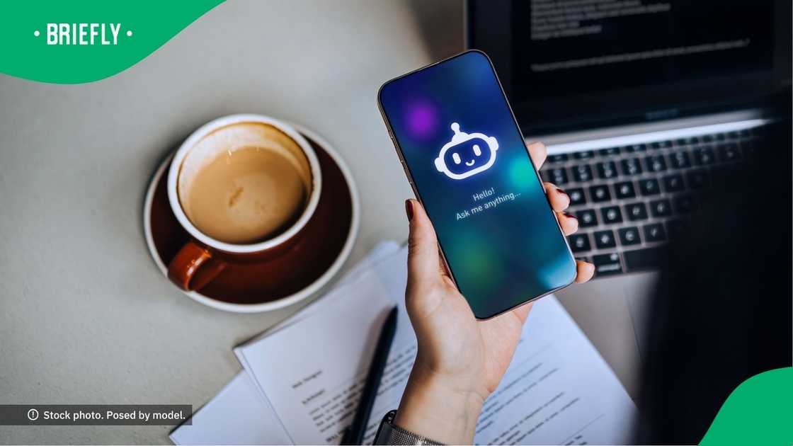 Businesswoman using an AI chatbot virtual assistance app.