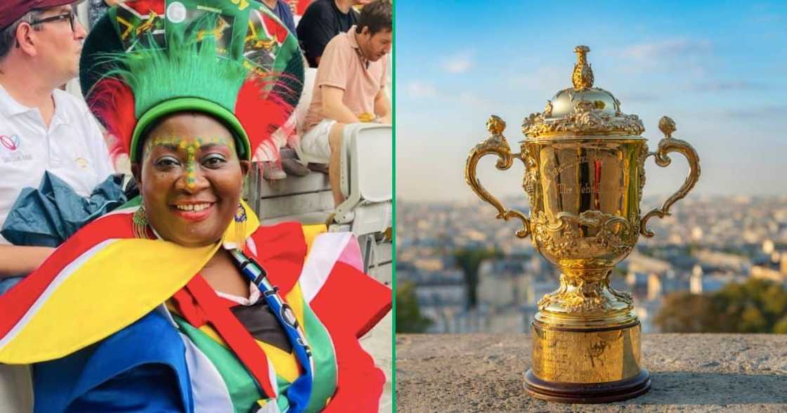 Mama Joy poses with the Webb Ellis Cup