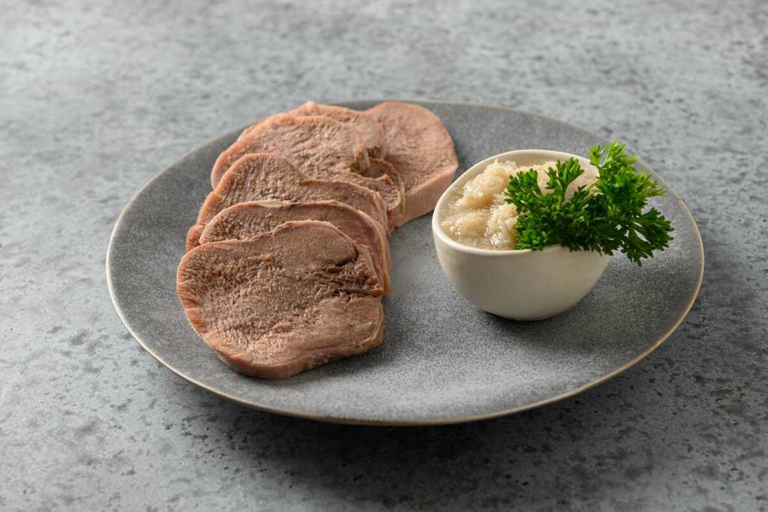 Cooked cow tongue slices Cooked cow tongue slices