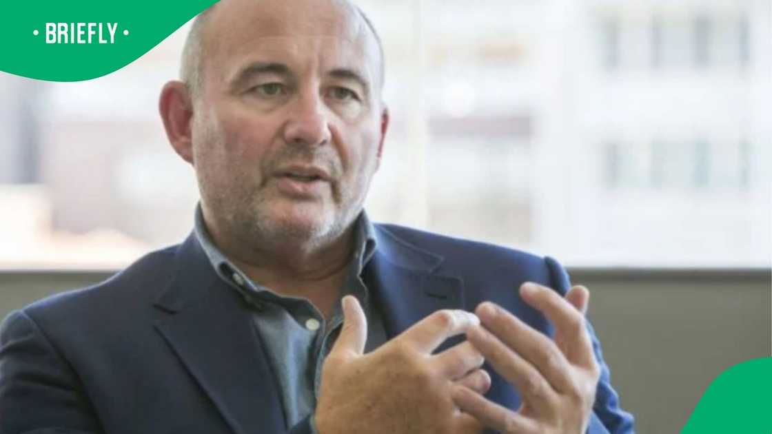 The corporate photograph showed executive Ian Moir speaking candidly in front of a bright, slightly blurred background