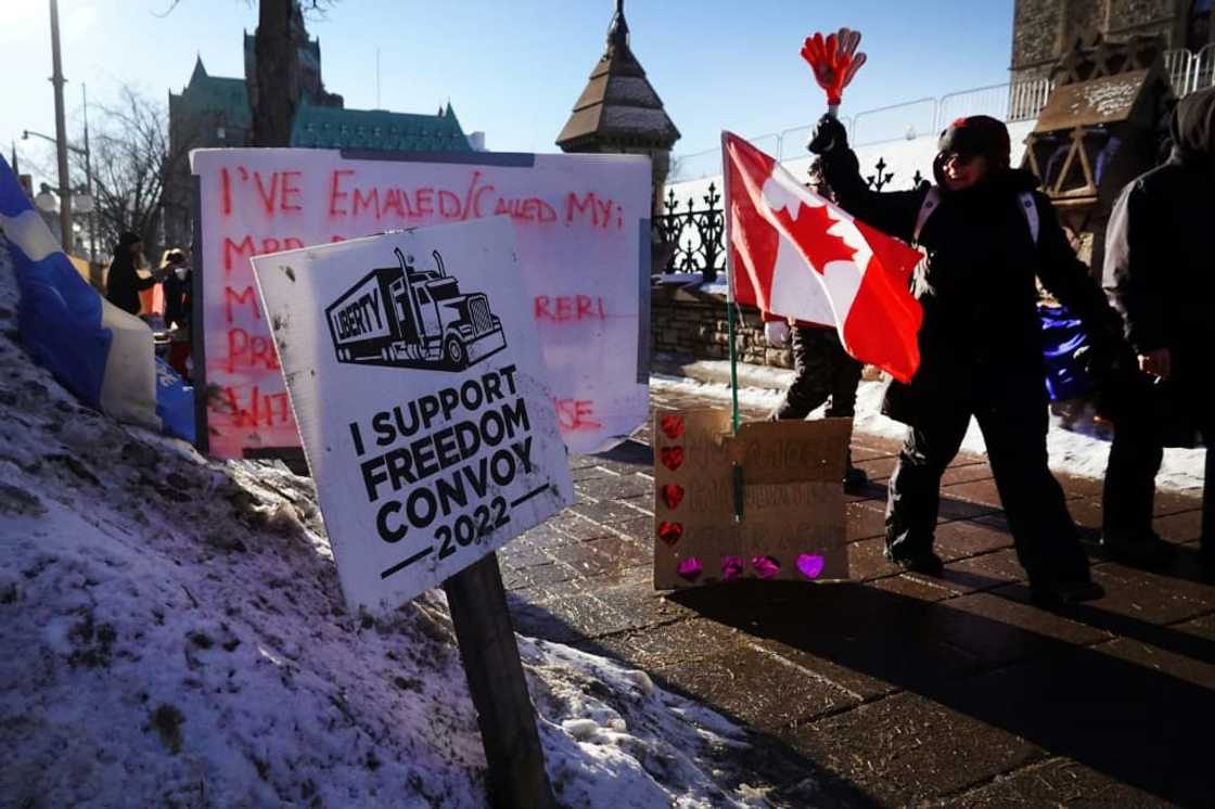 Truck drivers and their "Freedom Convoy" supporters block streets during an anti vaccine mandate protest near the Parliament Buildings on February 15, 2022 in Ottawa, Canada Truck drivers and their "Freedom Convoy" supporters block streets during an anti vaccine mandate protest near the Parliament Buildings on February 15, 2022 in Ottawa, Canada
