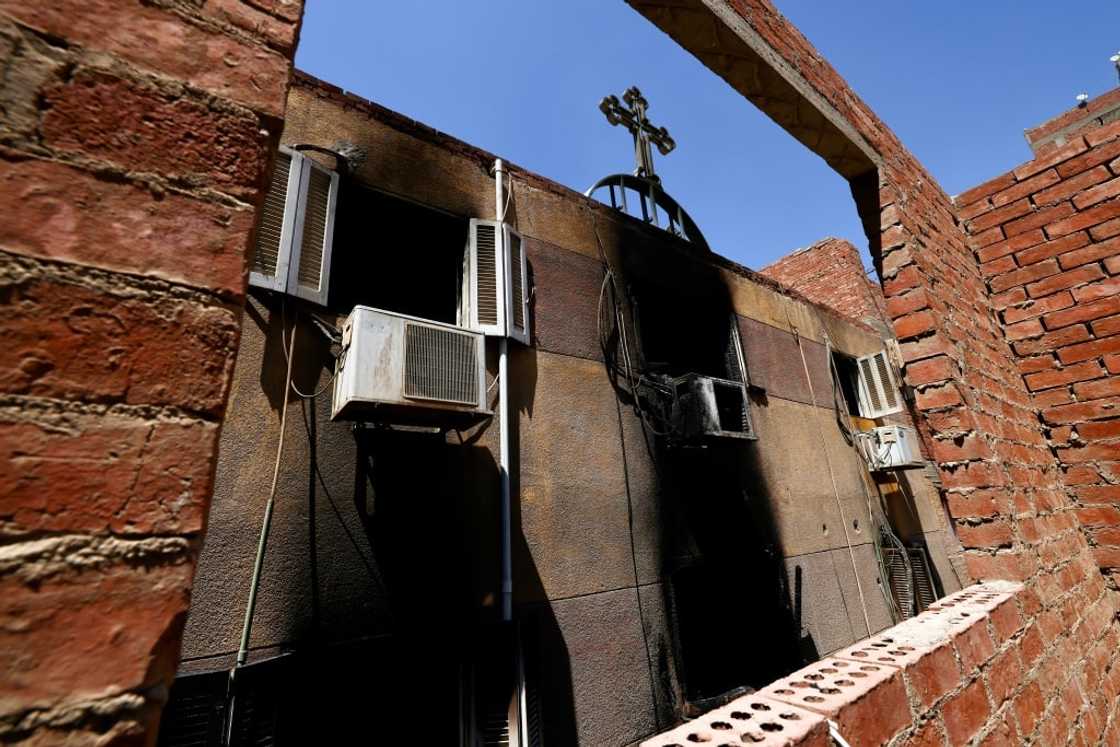 The charred Abu Sifin church located in the densely populated Imbaba neighbourhood west of the Nile river The charred Abu Sifin church located in the densely populated Imbaba neighbourhood west of the Nile river