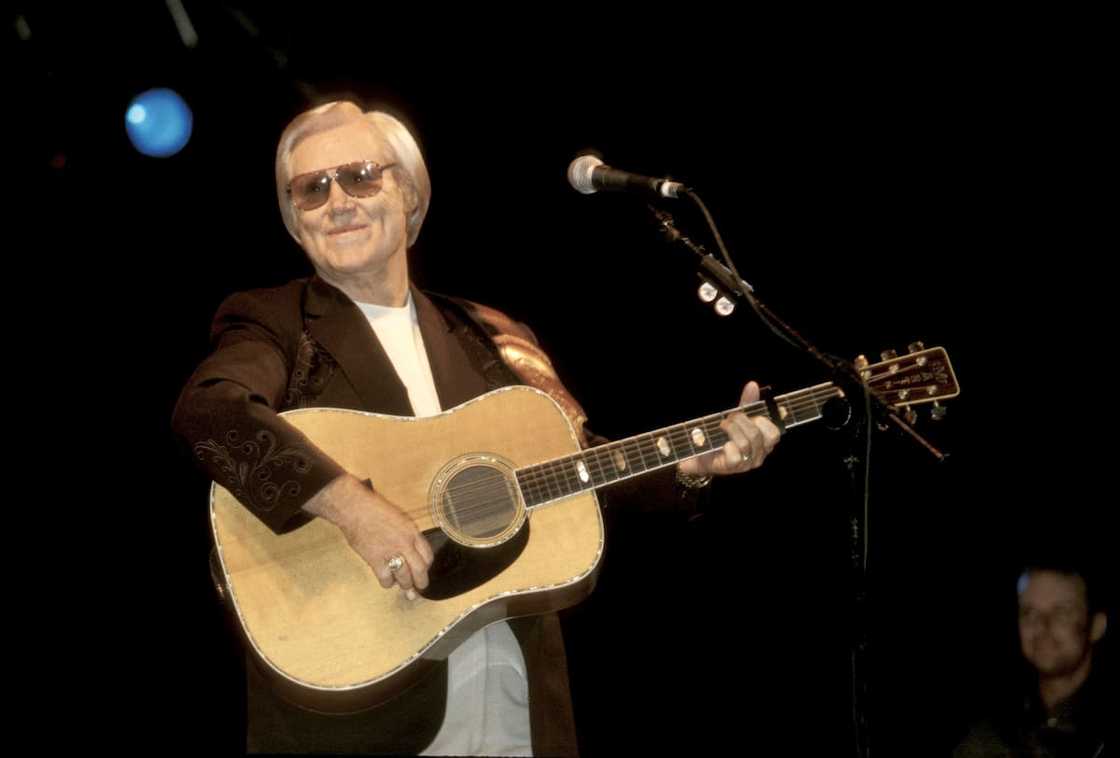 George Jones performs onstage