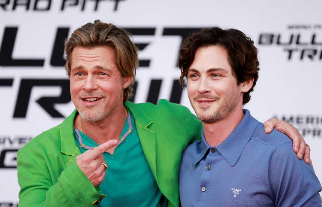 US actors Brad Pitt (L) and Logan Lerman attend the Los Angeles premiere of "Bullet Train" in Westwood, California