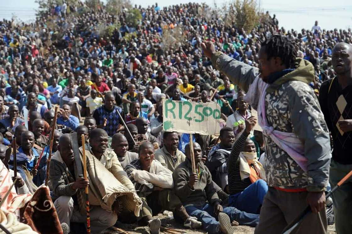 Workers at the platinum mine were demanding better wages Workers at the platinum mine were demanding better wages