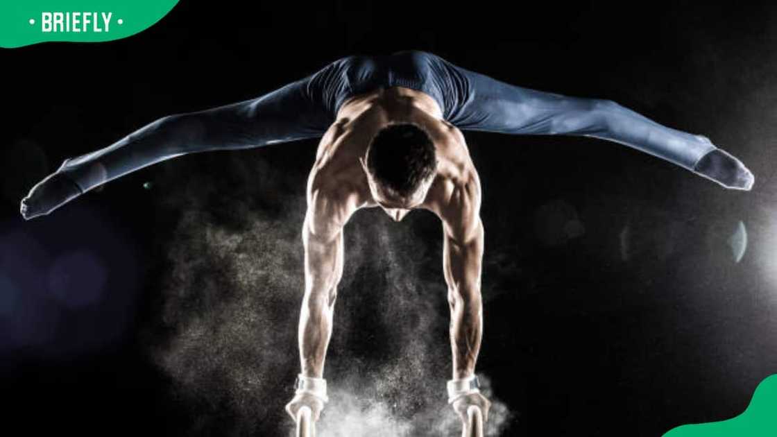 Male Gymnast in action Male Gymnast in action