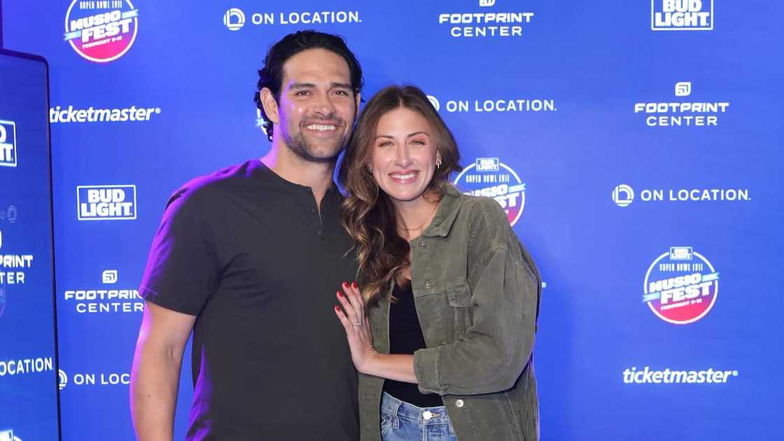 Mark Sanchez and Perry Mattfeld during the Bud Light Super Bowl Music Festival at Footprint Center on 10 February 2023 in Phoenix. Mark Sanchez and Perry Mattfeld during the Bud Light Super Bowl Music Festival at Footprint Center on 10 February 2023 in Phoenix.