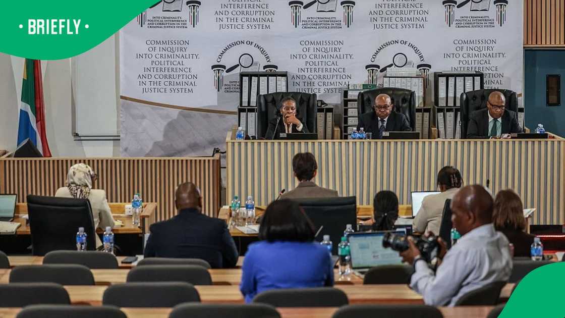 Commissioner Sesi Baloyi, Retired South African Constitutional Court Justice and former acting Deputy Chief Justice Mbuyiseni Madlanga and Commissioner Sandile Khumalo listen to evidence during the Madlanga Commission
