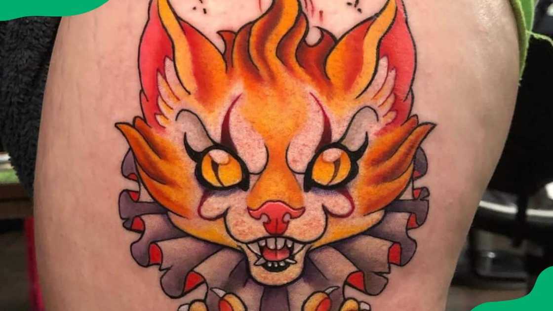 Firing cat tattoo Firing cat tattoo