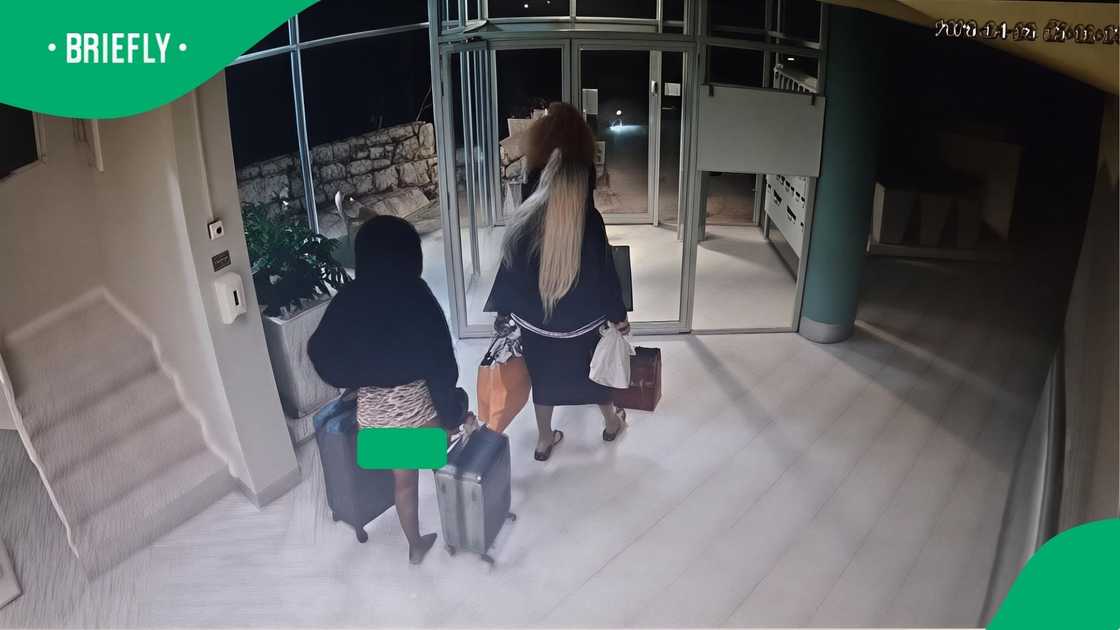 The suspects were seen carrying suitcases and designer shopping bags containing the stolen goods