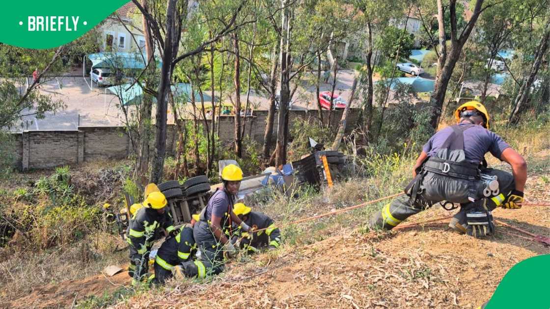 The truck overturned and ended up on the side of the road