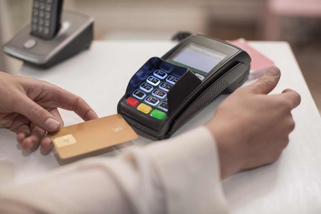 Young man was approved for various credit accounts Young man was approved for various credit accounts