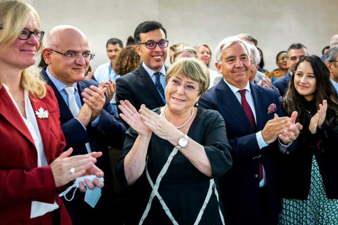 Outgoing UN High Commissioner for Human Rights Michelle Bachelet (C) is greeted at the United Nations in Geneva in August 2022 Outgoing UN High Commissioner for Human Rights Michelle Bachelet (C) is greeted at the United Nations in Geneva in August 2022
