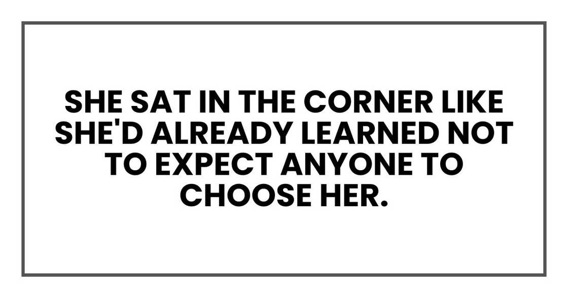 She sat in the corner like she'd already learned not to expect anyone to choose her. She sat in the corner like she'd already learned not to expect anyone to choose her.