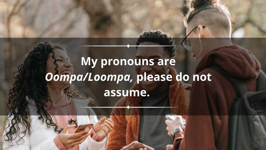 Three friends outdoors laughing Three friends outdoors laughing