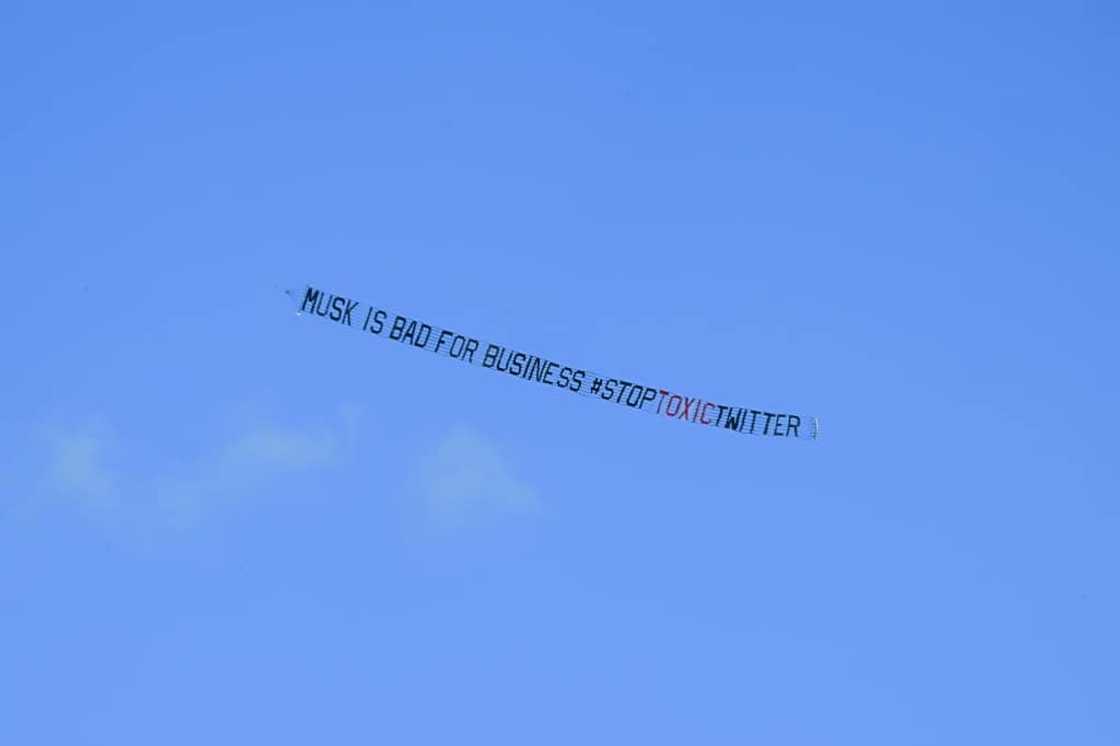 A banner reading, "Musk is Bad for Business #StopToxicTwitter" is flown over a conference venue in Miami, Florida where the Twitter CEO made a keynote address A banner reading, "Musk is Bad for Business #StopToxicTwitter" is flown over a conference venue in Miami, Florida where the Twitter CEO made a keynote address