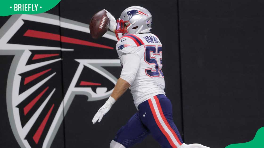 New England Patriots Kyle Van Noy scores a touchdown after an interception