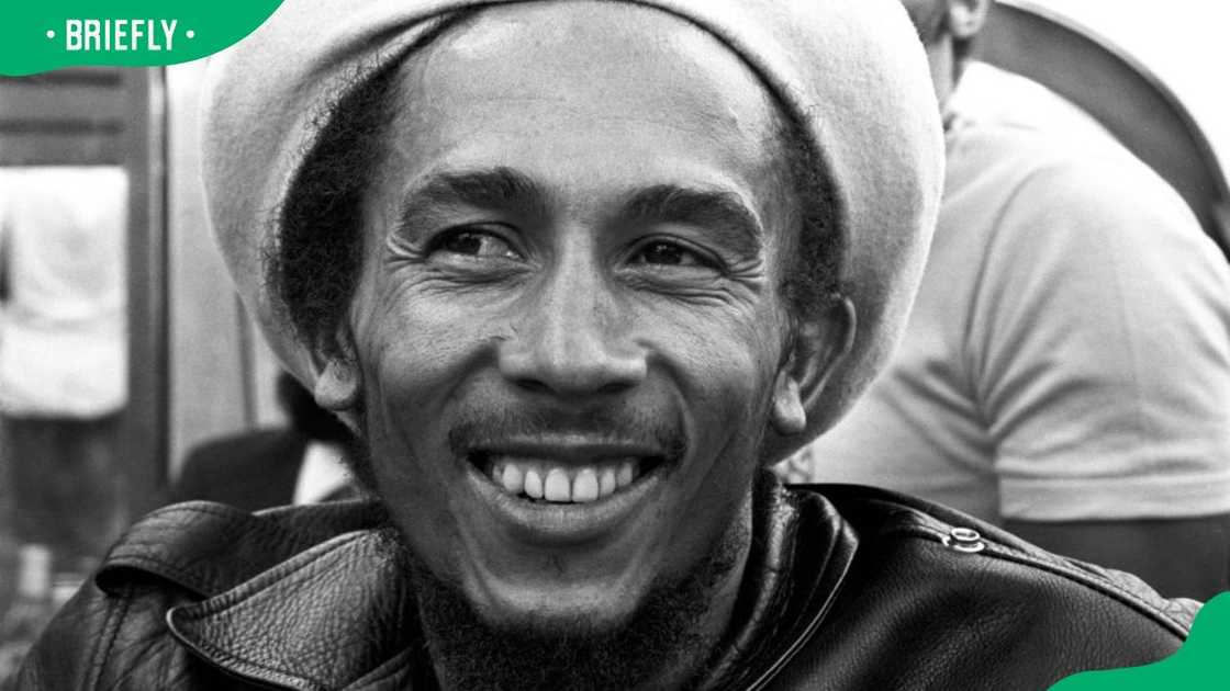 Jamaican reggae musician Bob Marley posing by a river in Amsterdam, Netherlands in 1976 Jamaican reggae musician Bob Marley posing by a river in Amsterdam, Netherlands in 1976