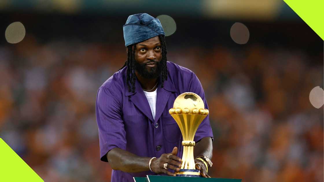 Emmanuel Adebayor placing the AFCON trophy on the podium before the 2023 final. Emmanuel Adebayor placing the AFCON trophy on the podium before the 2023 final.