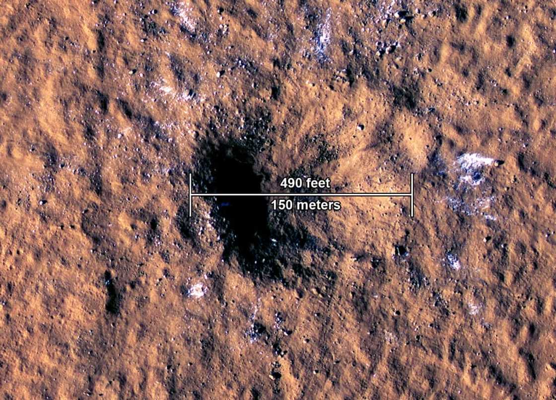 NASA said the meteor that smashed into Mars on December 24, 2021, left a crater 492-feet wide NASA said the meteor that smashed into Mars on December 24, 2021, left a crater 492-feet wide