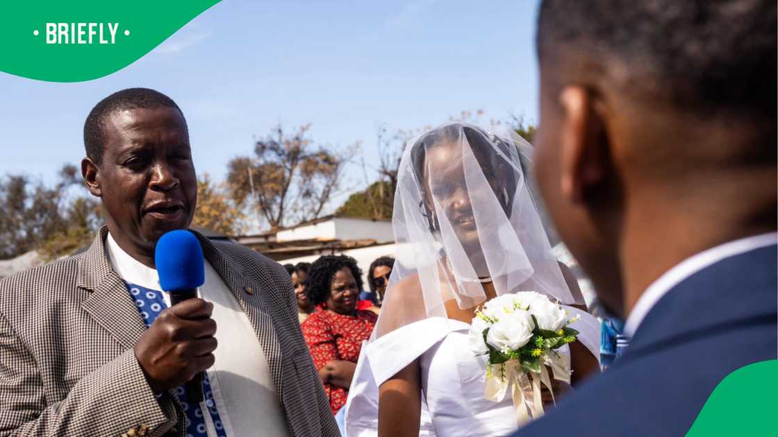 The bride was accompanied by her dad during the wedding ceremony