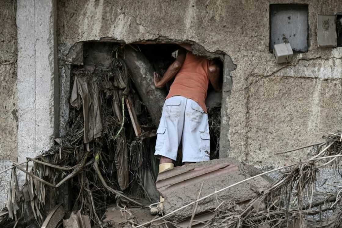 Around a thousand people joined the rescue efforts in Las Tejerias, Venezuela to search for victims stuck in the rubble after a landslide due to heavy rains October 9, 2022