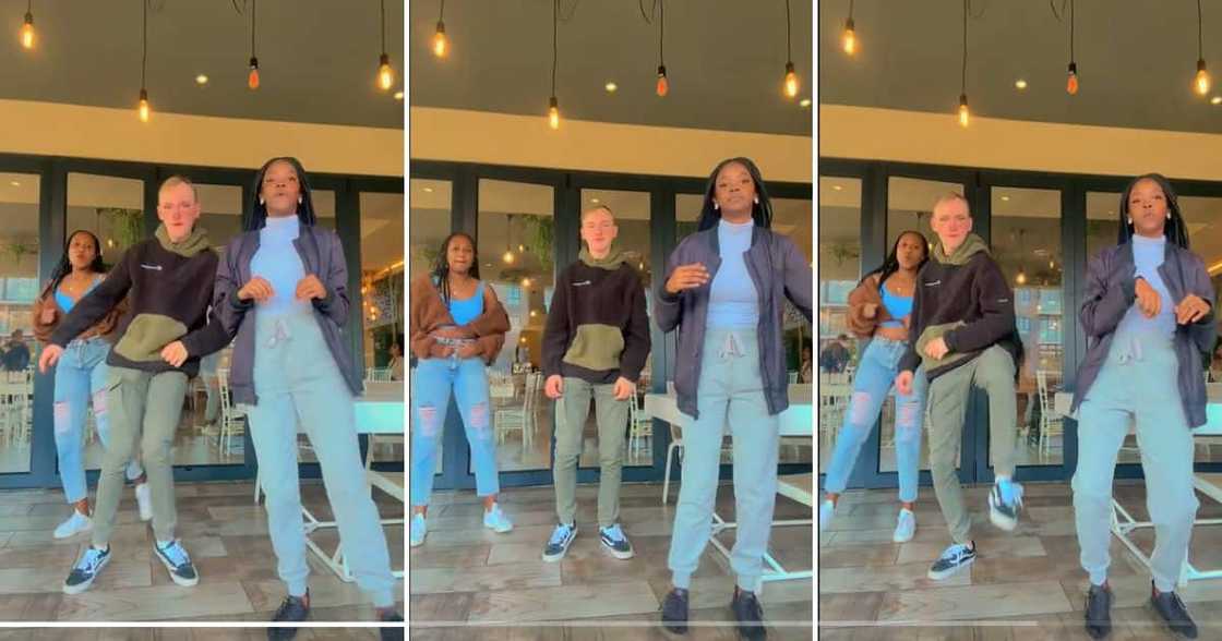 Young man struggles to keep up with girls during dance Young man struggles to keep up with girls during dance