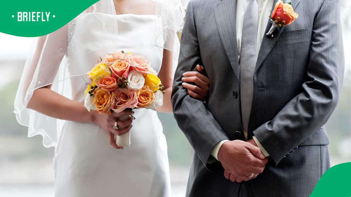 Philippine couple refuses to postpone wedding and says “I do” as floodwaters surround church