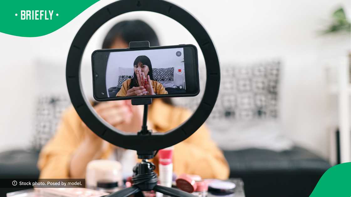 The woman loves making all kinds of skits. The woman loves making all kinds of skits.