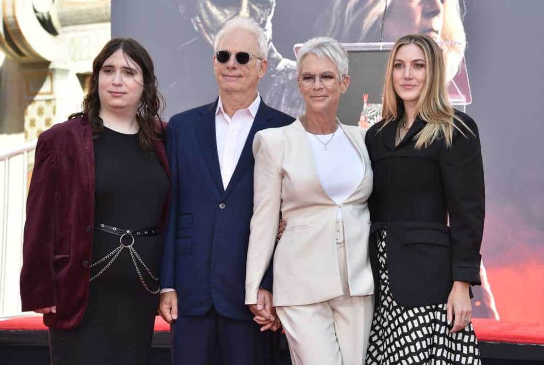 Jamie Lee (2nd right) with her husband Christopher Guest, and daughters Ruby (left) and Annie (right) during her hand and footprint ceremony in the courtyard of the TCL Chinese theatre. Jamie Lee (2nd right) with her husband Christopher Guest, and daughters Ruby (left) and Annie (right) during her hand and footprint ceremony in the courtyard of the TCL Chinese theatre.