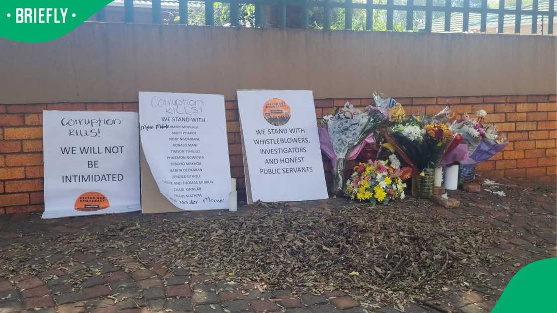 Tributes have been left outside Marius Van der Merwe's home Tributes have been left outside Marius Van der Merwe's home