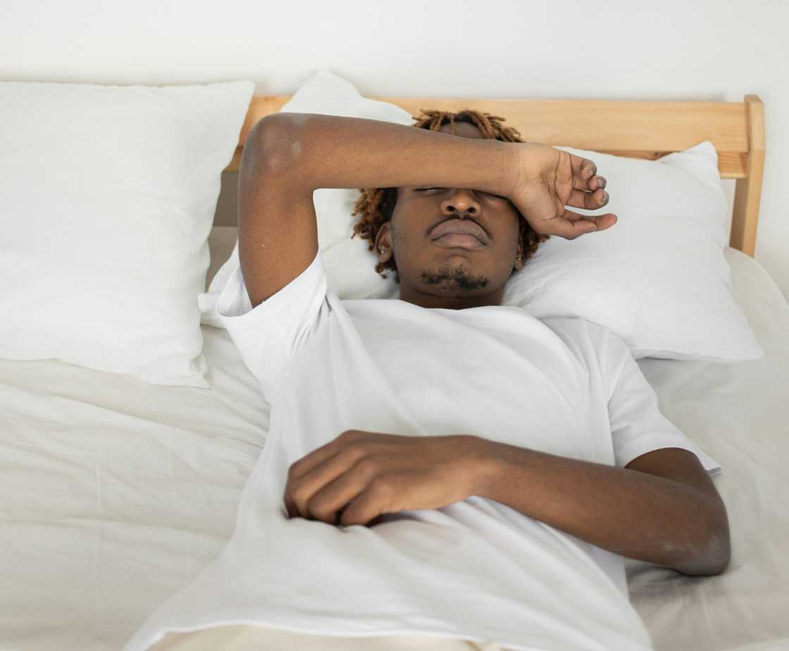 A man lying on the bed