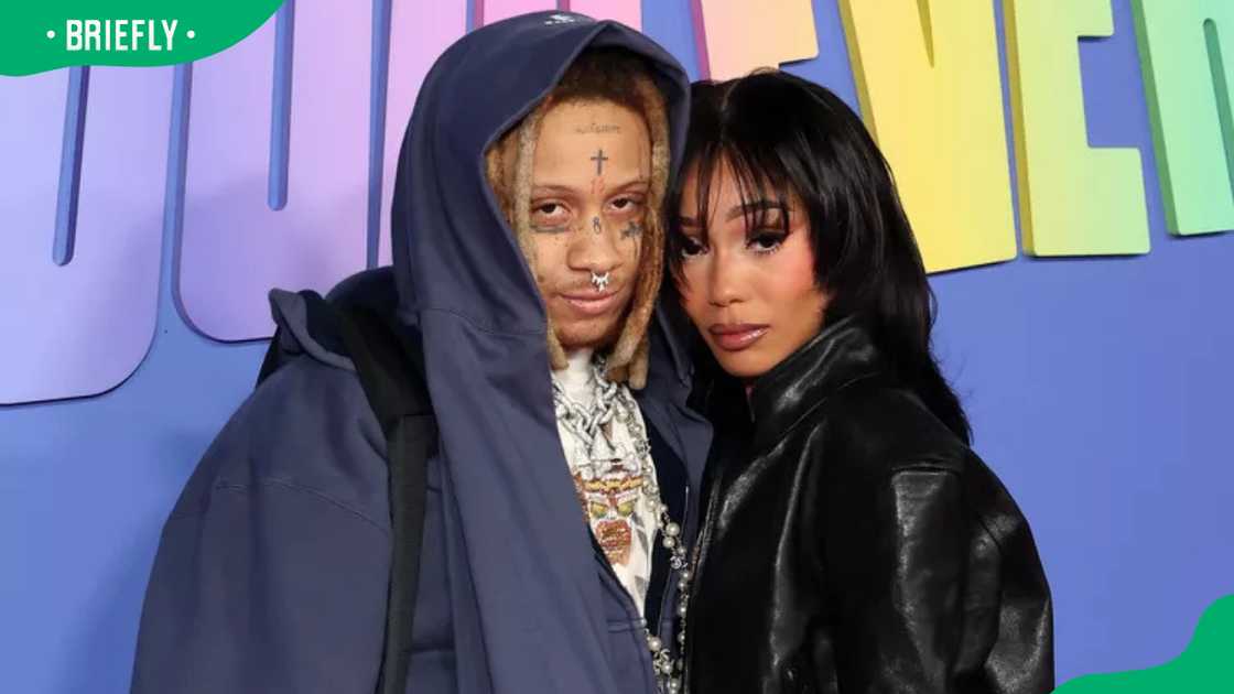 Trippie Redd and Coi Leray at the red carpet premiere of “Dullsville And The Doodleverse” Trippie Redd and Coi Leray at the red carpet premiere of “Dullsville And The Doodleverse”