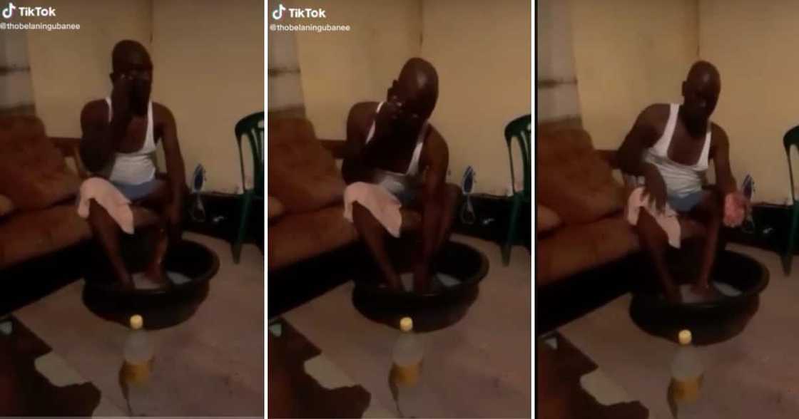 An irritated man threw his phone into his bath water. An irritated man threw his phone into his bath water.