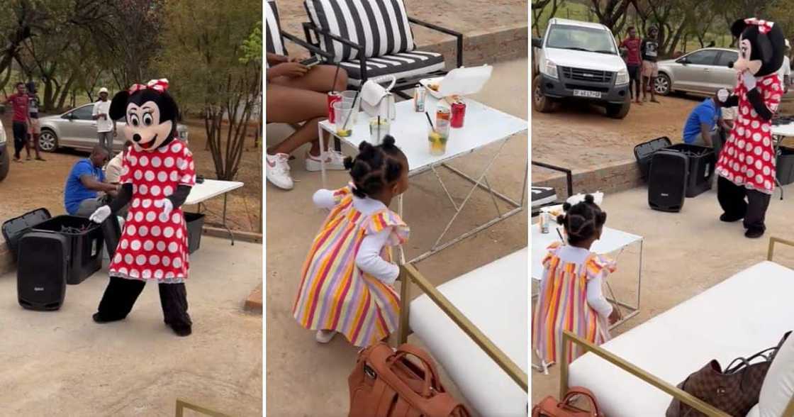 Little girl dancing with Minnie Mouse Little girl dancing with Minnie Mouse