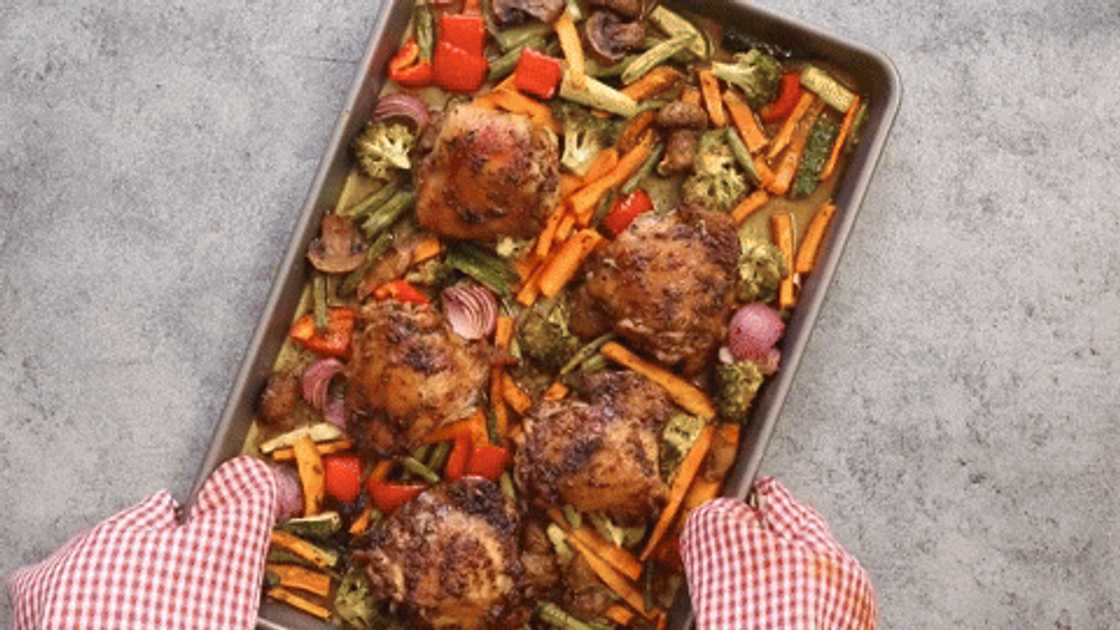 Preparing balsamic chicken and veggie bake Preparing balsamic chicken and veggie bake