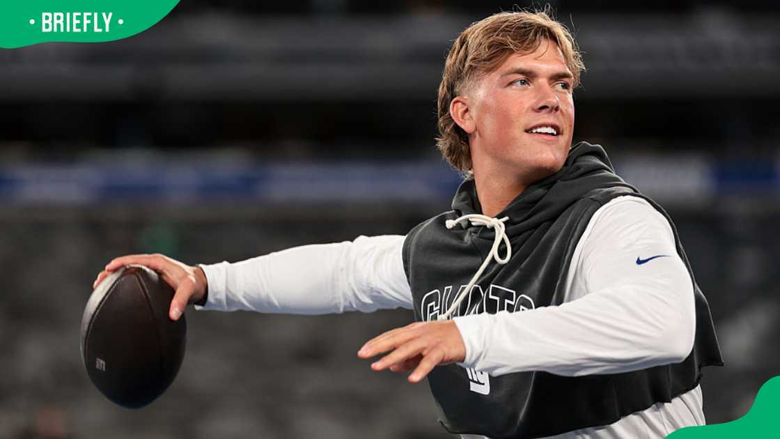 NFL star Jaxson Dart during a 2025 game against the Philadelphia Eagles at MetLife Stadium NFL star Jaxson Dart during a 2025 game against the Philadelphia Eagles at MetLife Stadium