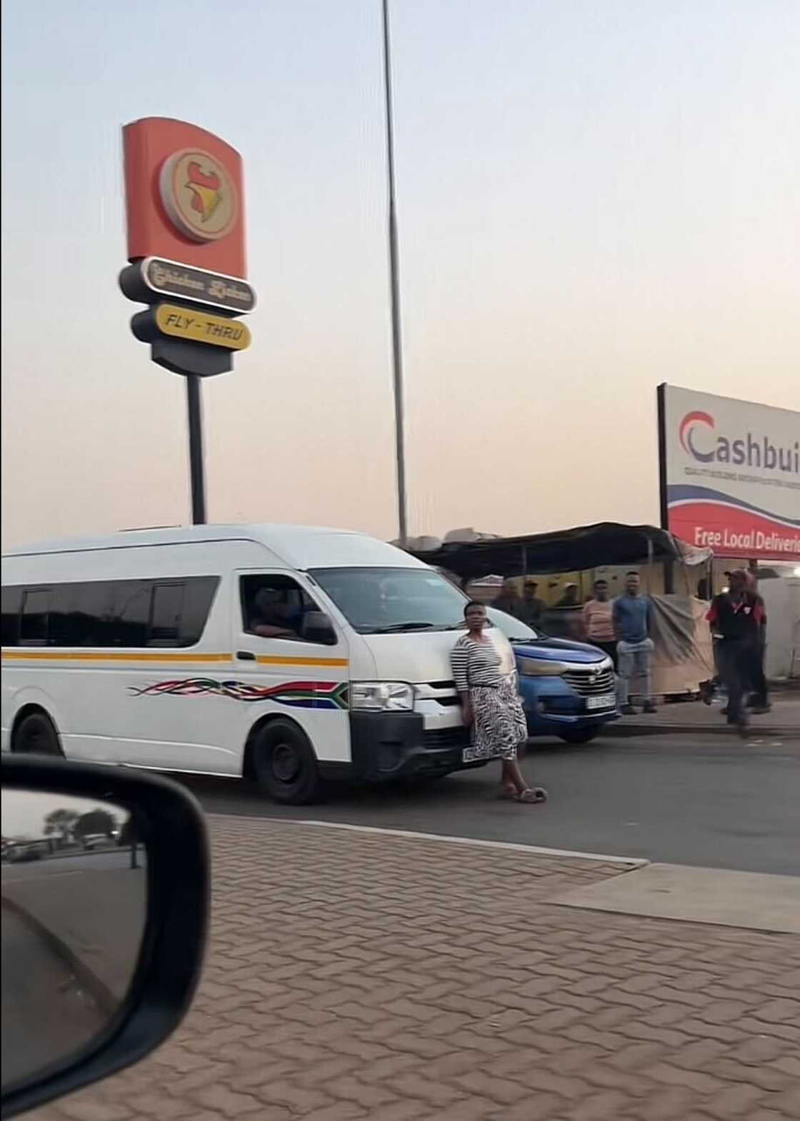 South Africans joked about Umjolo issues while a woman stood in front of a moving taxi.