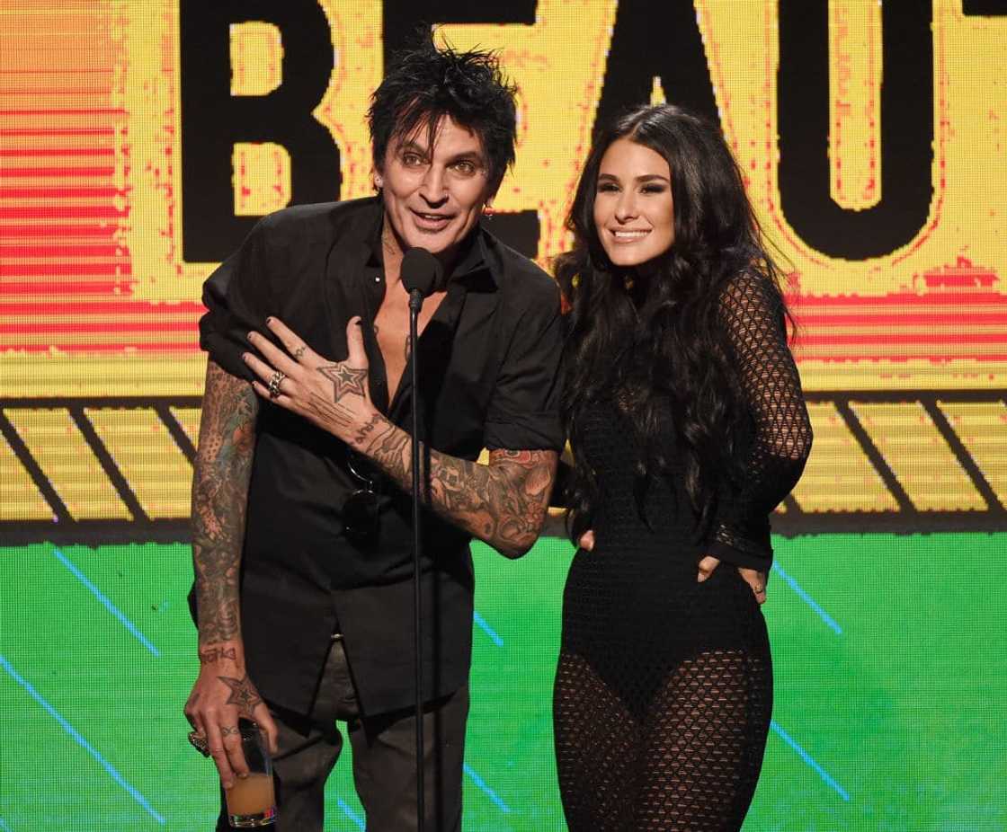 Tommy Lee and Brittany Furlan onstage Tommy Lee and Brittany Furlan onstage