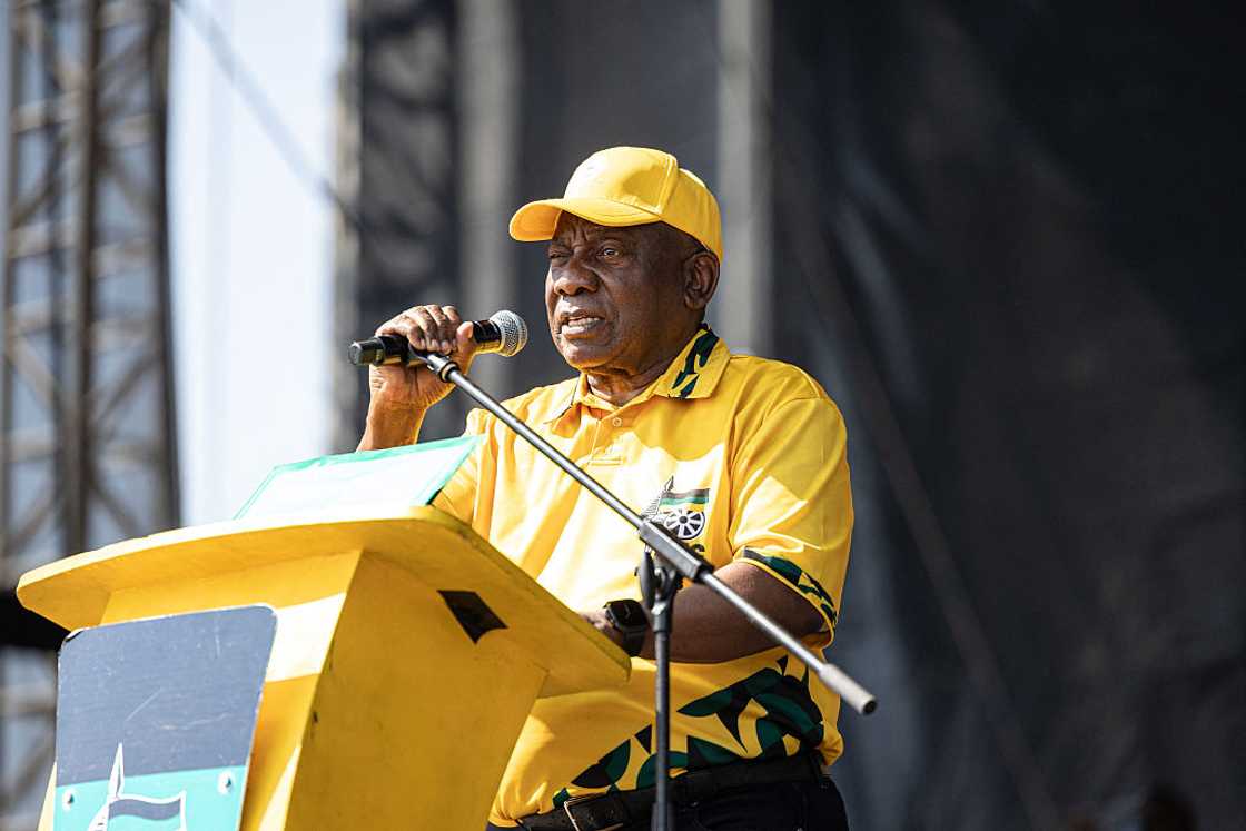 Cyril Ramaphosa addresses supporters during the African National Congress's (ANC) 2026 local government election manifesto launch in Diepsloot near Johannesburg on August 23, 2026, ahead of the country's upcoming municipal elections