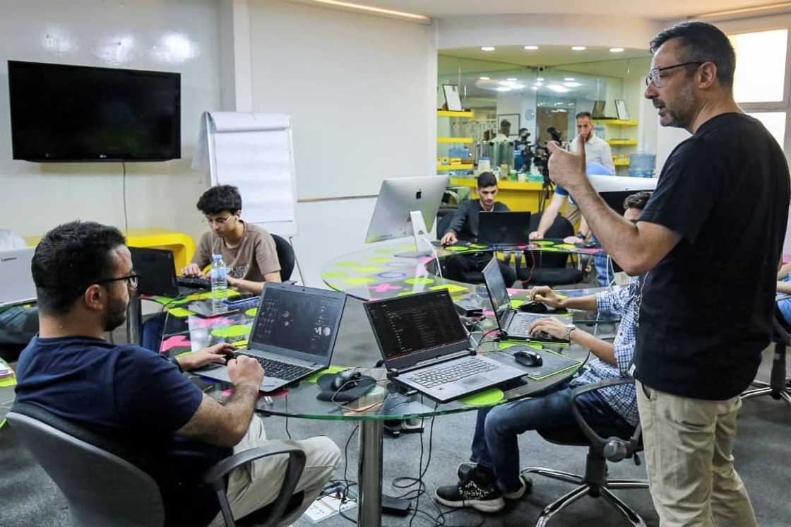 Nour Khrais, technical partner in The Jordan Gaming Lab, which provides equipment and educational courses to young people on all aspects of the gaming industry, talks to his team at their office in Amman Nour Khrais, technical partner in The Jordan Gaming Lab, which provides equipment and educational courses to young people on all aspects of the gaming industry, talks to his team at their office in Amman