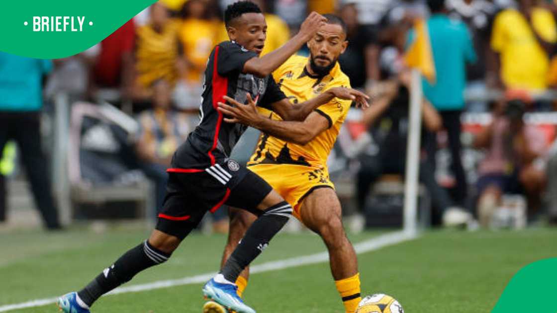 Pirate's South African forward #38 Relebohile Mofokeng shields the ball during the Premier Soccer League (PSL) South African Premier Division football match between Orlando Pirates and Kaizer Chiefs at the FNB Stadium in Johannesburg on March 9, 2024.