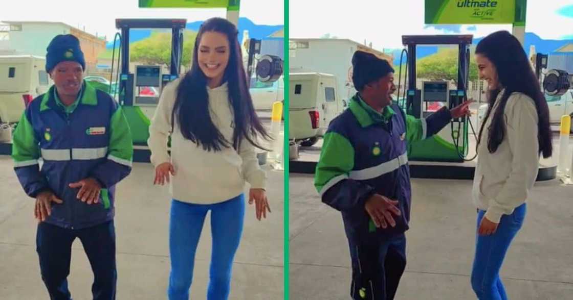 A BP petrol attendant dances with a woman A BP petrol attendant dances with a woman