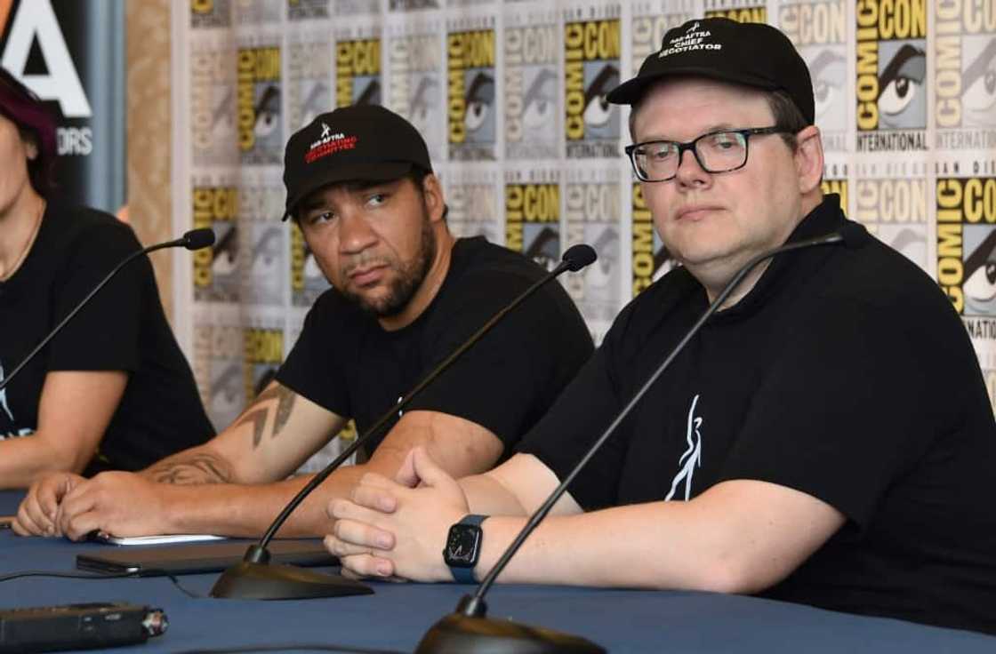 Zeke Alton (L) and SAG-AFTRA's chief negotiator Duncan Crabtree-Ireland attend a Comic-Con press junket Zeke Alton (L) and SAG-AFTRA's chief negotiator Duncan Crabtree-Ireland attend a Comic-Con press junket
