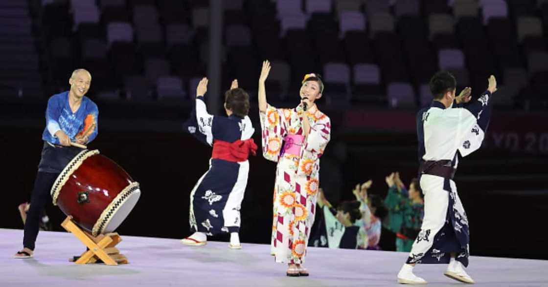 A singer during the Closing Ceremony on day sixteen of the Tokyo 2020 Olympic Games at Olympic Stadium on August 8, 2021 in Tokyo, Japan. (Photo by Jean Catuffe/Getty Images). A singer during the Closing Ceremony on day sixteen of the Tokyo 2020 Olympic Games at Olympic Stadium on August 8, 2021 in Tokyo, Japan. (Photo by Jean Catuffe/Getty Images).