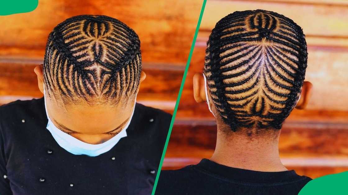 A woman with neat cornrows and a middle part design A woman with neat cornrows and a middle part design