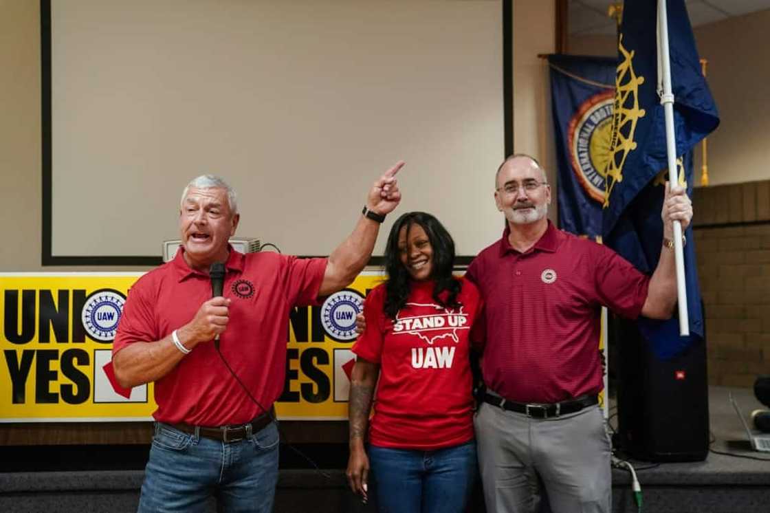 United Auto Workers (UAW) President Shawn Fain, right, celebrates with local organizers at a UAW vote watch party on April 19, 2024 in Chattanooga, Tennessee United Auto Workers (UAW) President Shawn Fain, right, celebrates with local organizers at a UAW vote watch party on April 19, 2024 in Chattanooga, Tennessee