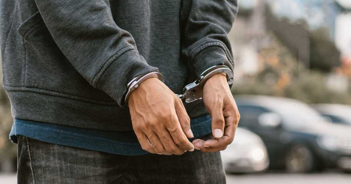 man handcuffed and arrested man handcuffed and arrested